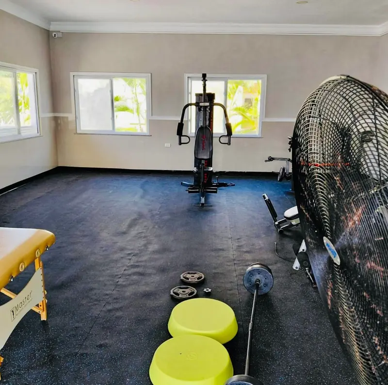 Community gym with weights and a multi-station machine